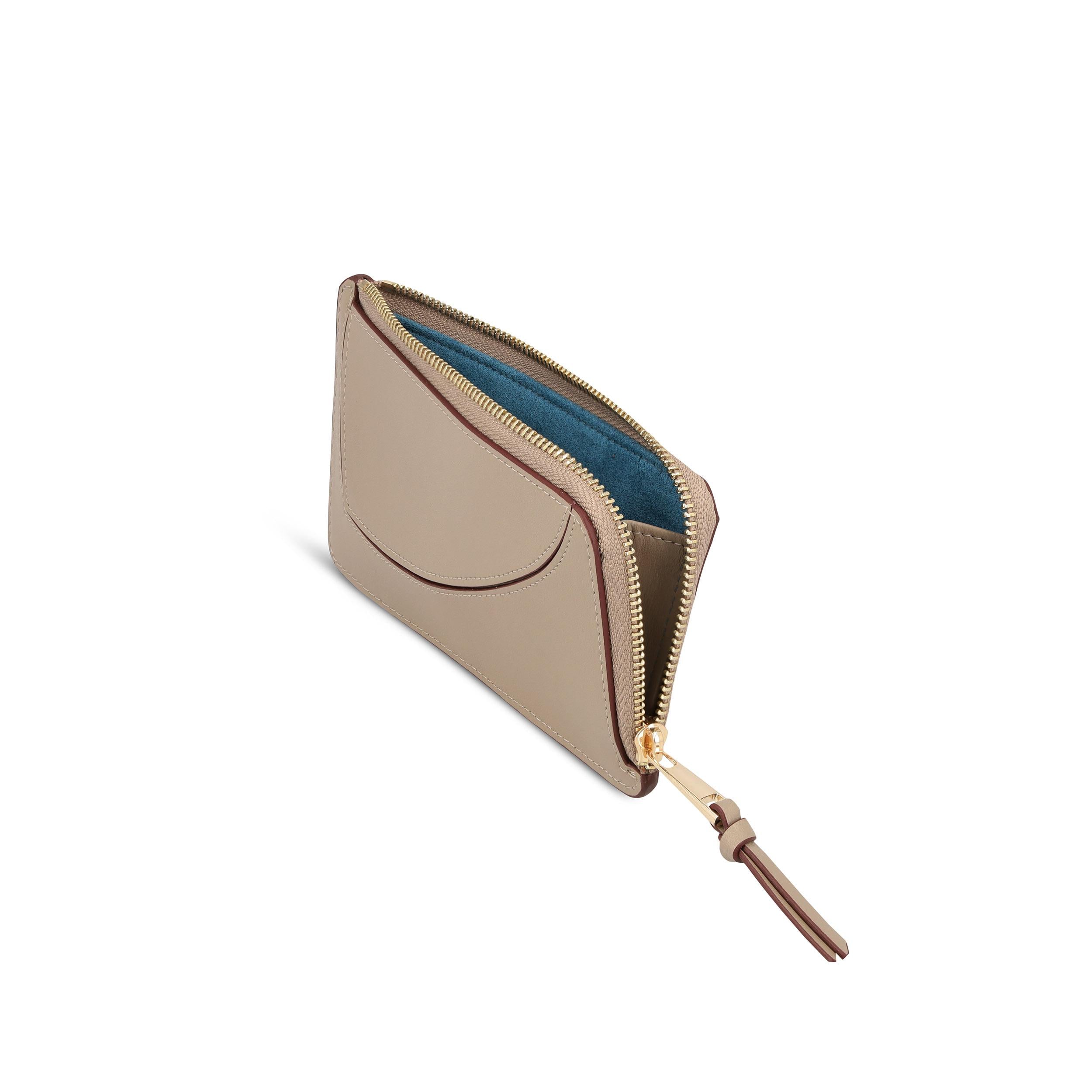 Portefeuilles, Taupe