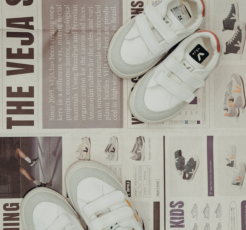 veja kinderschoenen op krant